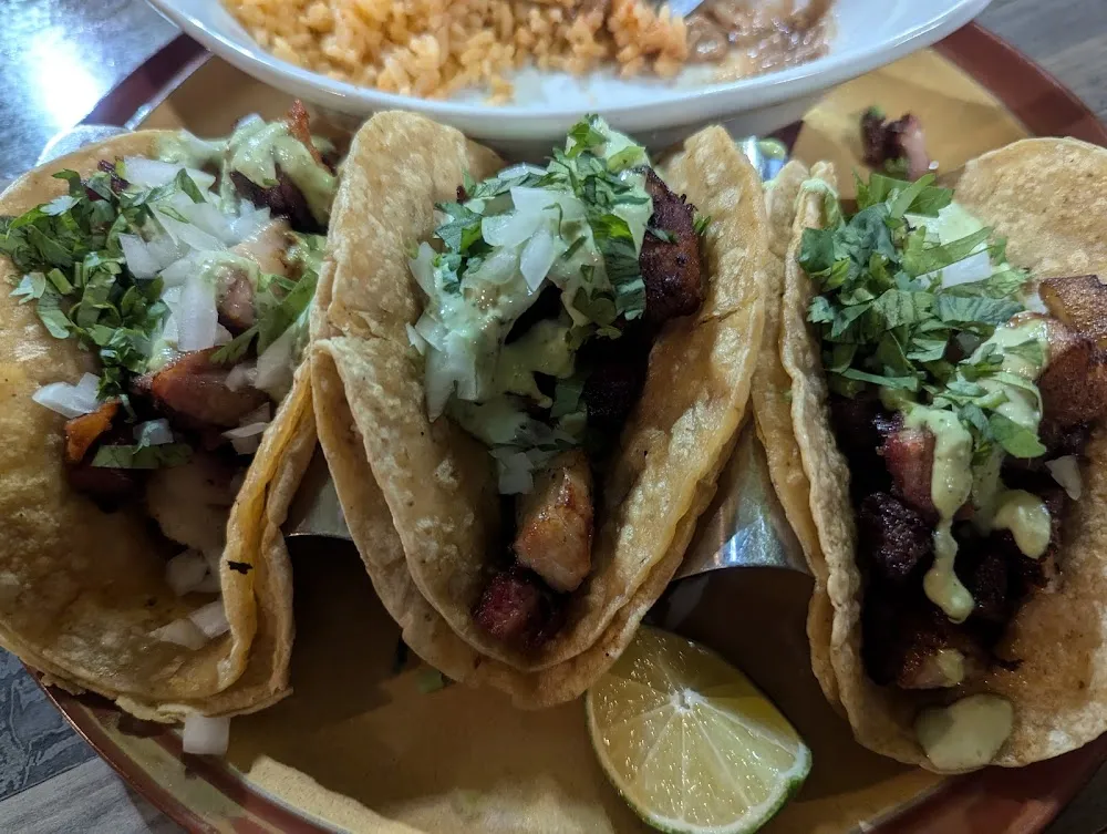 Two Beef Tacos Rice & Beans